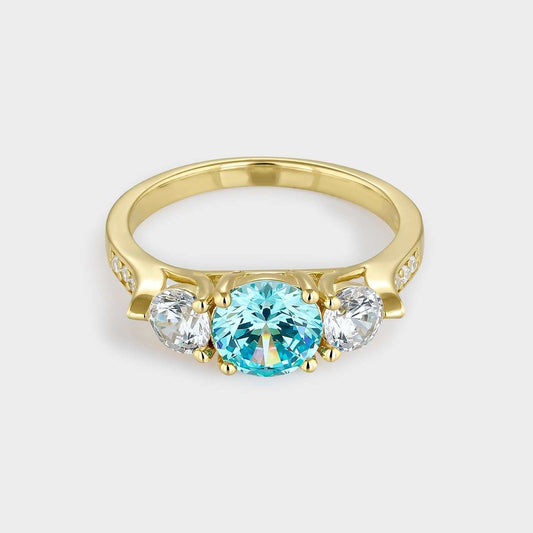 Anillo con circonita azul aguamarina, plata de ley 925 con baño de oro
