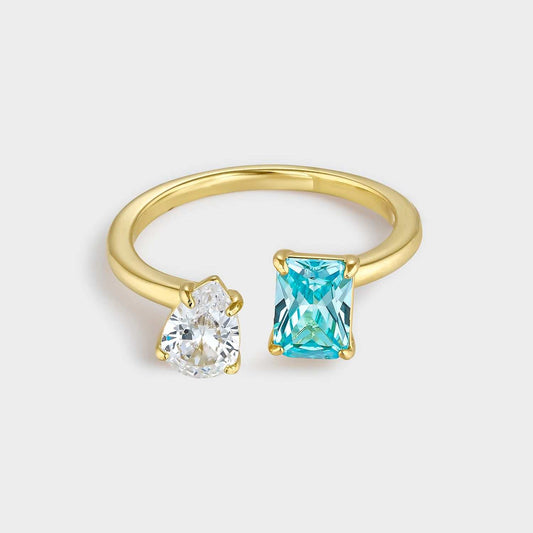 Anillo de plata de ley 925 dúo baño de oro circonitas azul y blanca