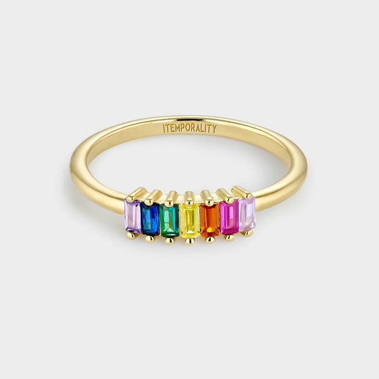 Anillo de plata bañada en oro amarillo con circonitas multicolor rectangulares.